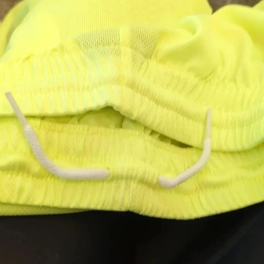BOYS neon green Nike shorts